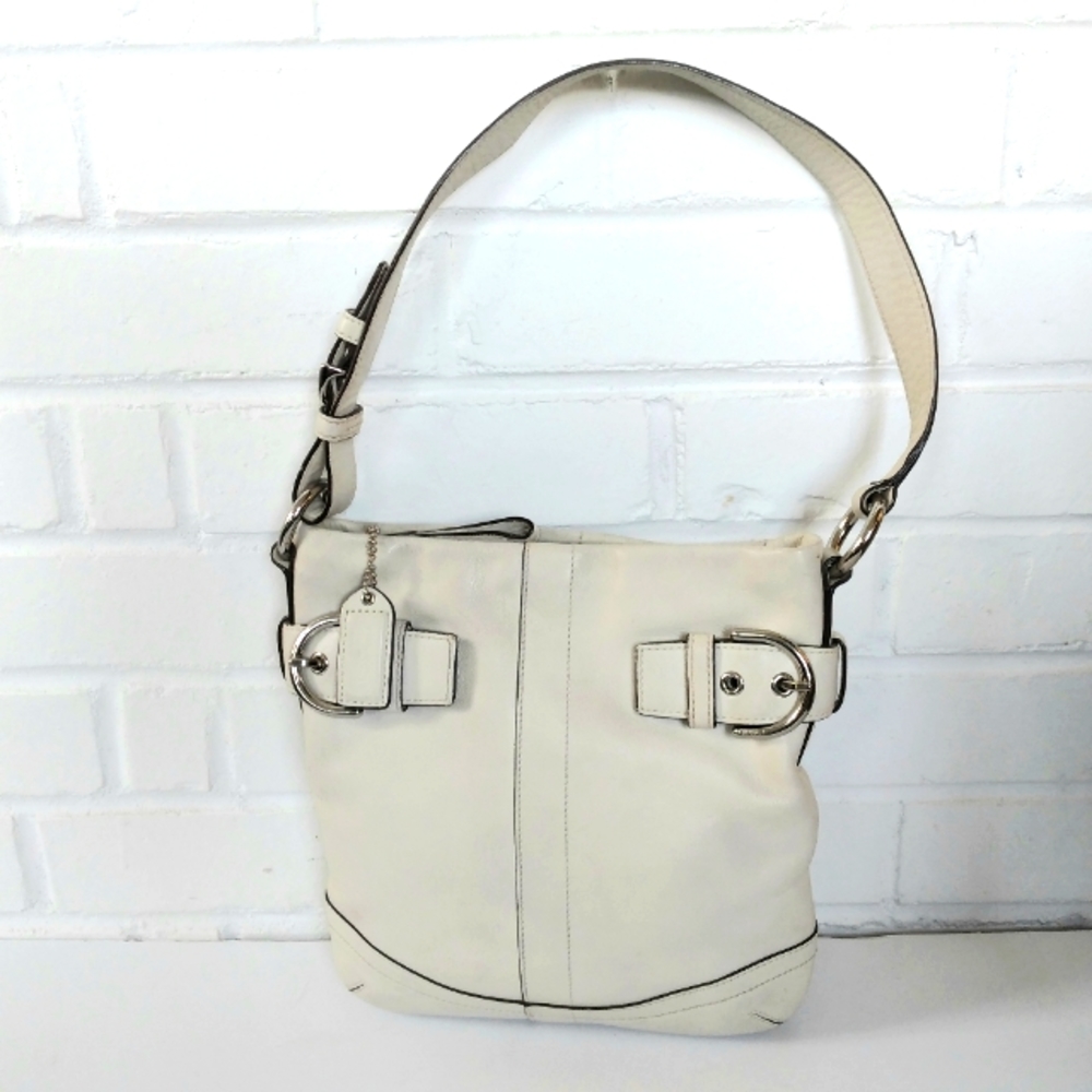 Small Coach leather bag cream color